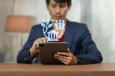Businessman Using Tablet with Digital Overlay of Growth and Connection Icon.. Stock Photos