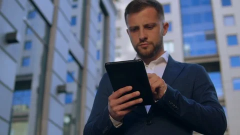 Businessman using tablet Stock Footage 90735593