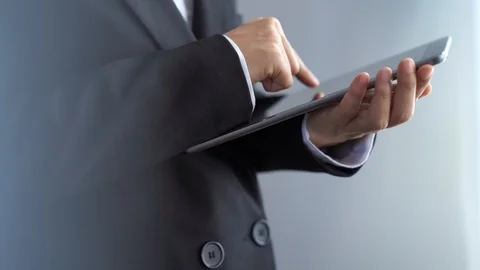 Businessman using tablet at office, working for success concept Stock Footage 121295509