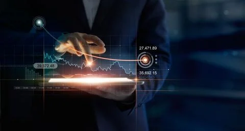 Businessman using tablet online analyzing growth graph financial data Fotos Stock