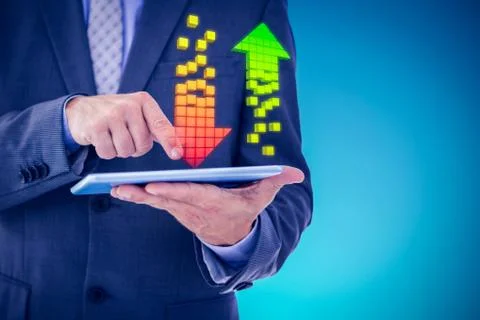 Businessman using tablet pc against blue vignette background Stock Photos