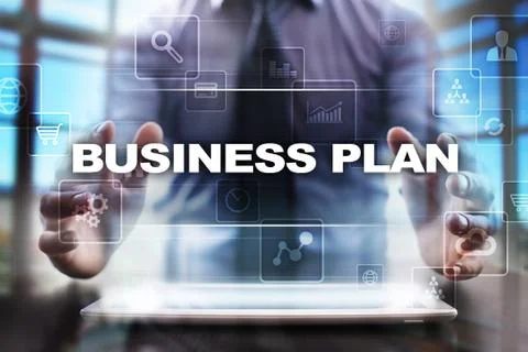Businessman using tablet pc and selecting business plan. Stock-Fotos