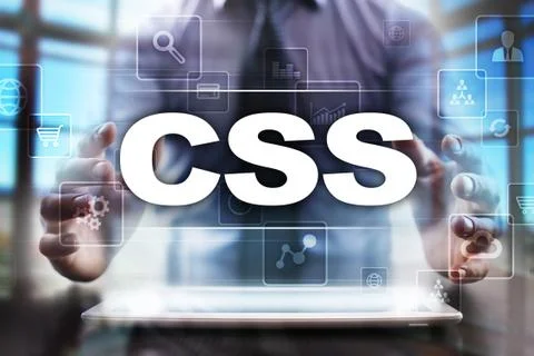 Businessman using tablet pc and selecting css. Stock Photos