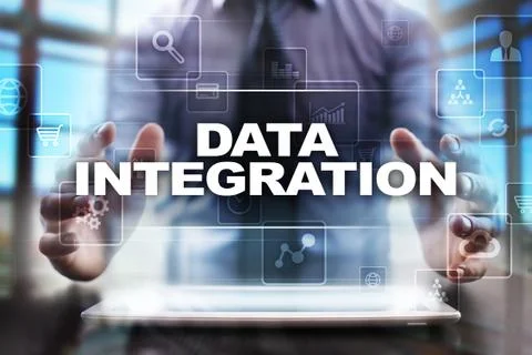 Businessman using tablet pc and selecting data integration. Stock Photos