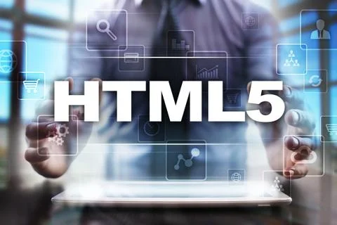 Businessman using tablet pc and selecting html5. Photos
