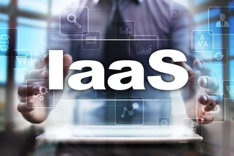Businessman using tablet pc and selecting iaas. Stock Photos