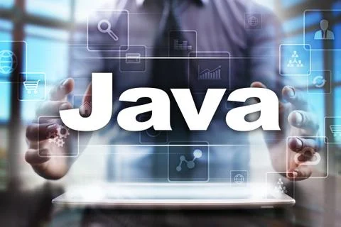Businessman using tablet pc and selecting java. 库存照片