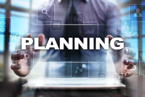 Businessman using tablet pc and selecting planning. Фото
