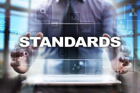Businessman using tablet pc and selecting standards. 스톡 사진