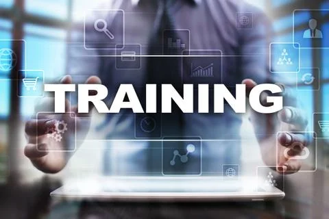 Businessman using tablet pc and selecting training. Fotos Stock