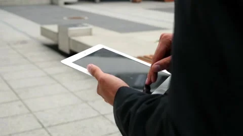 Businessman using tablet pc. Close up. Stock Footage 60945208