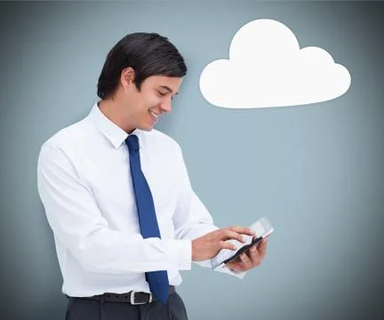 Businessman using a tablet pc with cloud computing symbol 스톡 사진