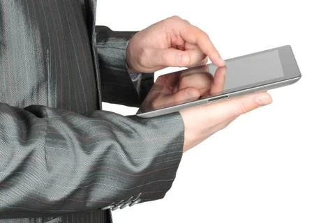 Businessman using tablet pc . Stock Photos