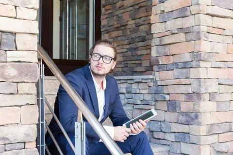 Businessman using a tablet pc Stock Photos