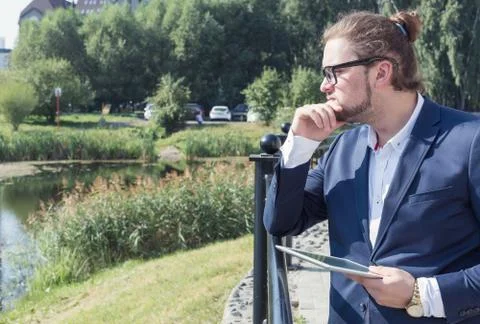 Businessman using a tablet pc Stock Photos