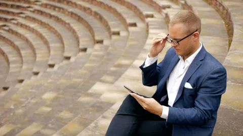 Businessman using tablet phone. brainstorming ideas. thinking. man male person Stock Footage 38100592