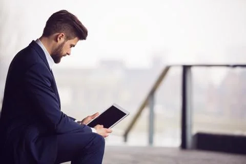 Businessman using tablet Stock Photos