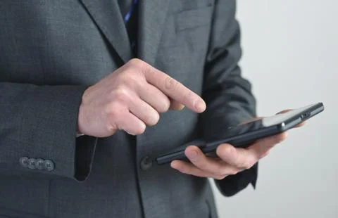 Businessman  using a tablet Stock Photos