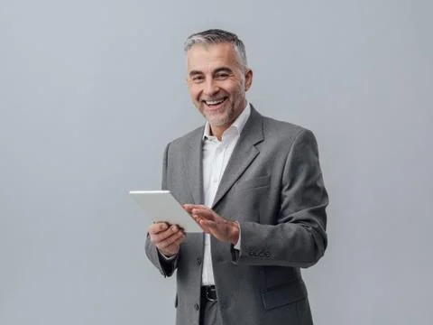 Businessman using a tablet Stock-Fotos