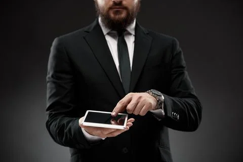 Businessman using tablet, scrolling screen Stock Photos