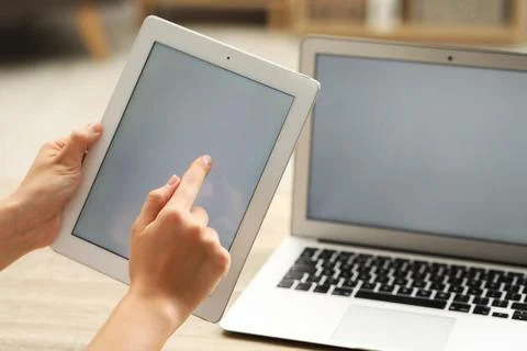 Businessman using tablet at table, closeup. Modern technology 스톡 사진