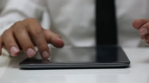 Businessman using tablet on table 스톡 동영상 65152832