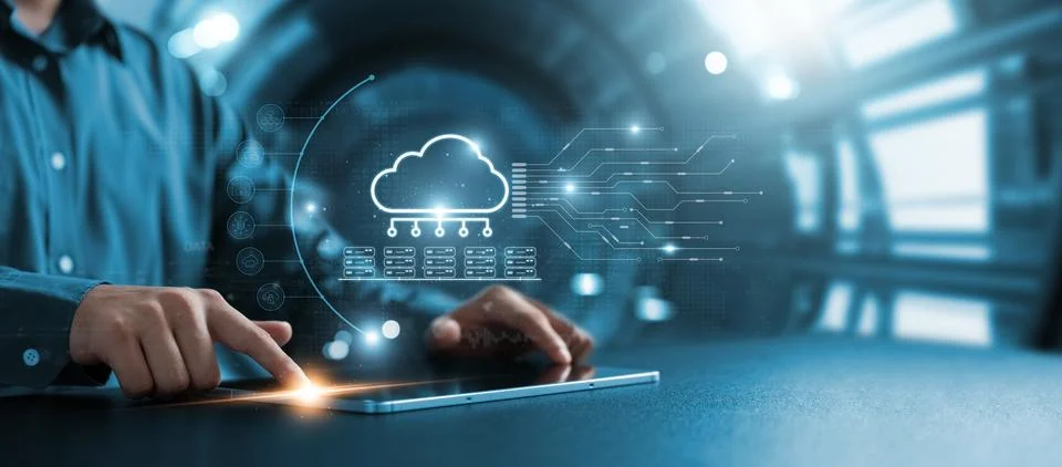 Businessman using tablet to transfer data on cloud computing, seamless data.. 写真素材