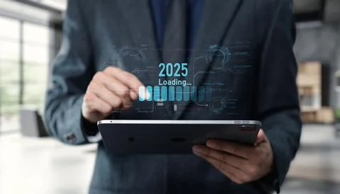 Businessman Using Tablet to Visualize Data Transition in 2025 Stock Photos