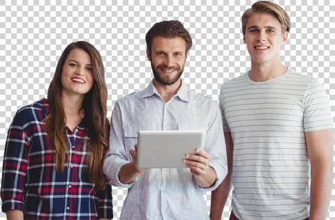 Businessman using tablet while standing with colleagues against white background Stock Photos
