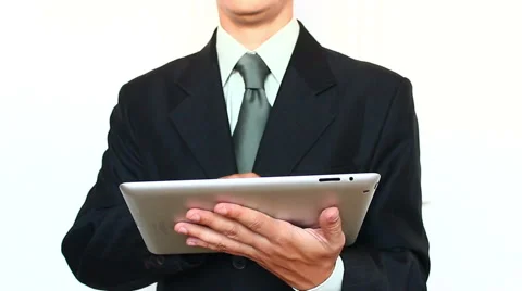 Businessman Using a Tablet For Work Stock Footage 53612015