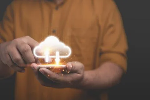 Businessman using technology smartphone with virtual cloud computing icon f.. Fotos Stock