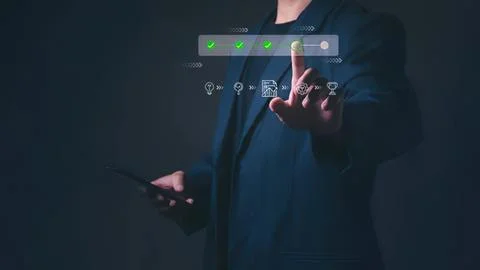 Businessman using touch screen with icons and graphs Stock Photos