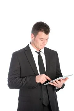 Businessman using a touchscreen tablet Stock Photos