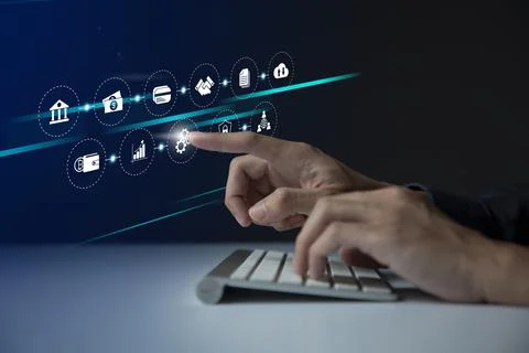 Businessman using virtual touch screen to online transactions with internet t Stock Photos