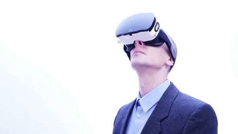 Businessman using VR-headset - 4 K Stock Footage 71208967