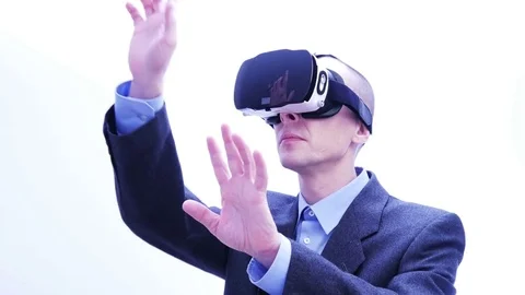 Businessman using VR-headset - 4 K Stock Footage 71209985