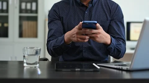 Businessman utilizing smartphone and tablet technology. Perfect for corpora.. Stock Footage 313460760