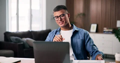 Businessman, video call and documents with laptop in home for finance proposal Stock Footage 330700008