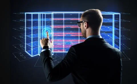 Businessman with virtual construction project Stock Photos