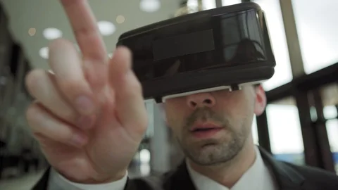 Businessman in VR headset working with visualized info Video stock 108682676