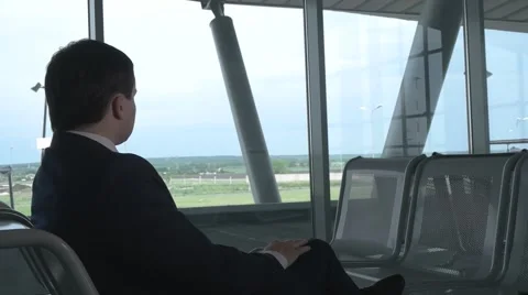 Businessman waiting for flight Stock Footage 67018214
