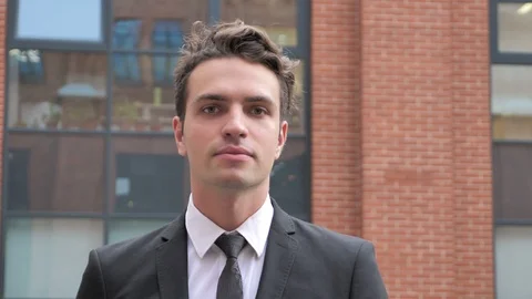 Businessman Walking and Using Tablet, Browsing Online Stock Footage 94849847