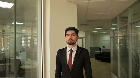 Businessman is walking around open plan office building Stock Footage 45267343