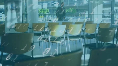 Businessman walking checking phone opening laptop working with binary overlay Stock Footage 333575391