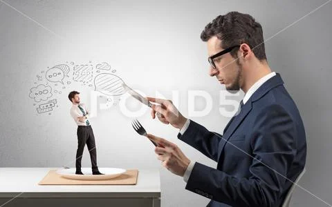 Businessman want to eat small man Stock Photos