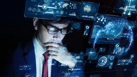 Businessman watching GUI (Graphical User Interface). Stock Footage 112987415