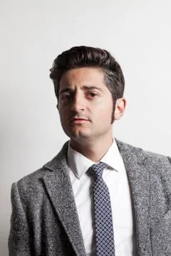 Businessman wearing grey jacket 10 Stock Photos