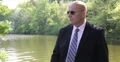 Businessman Wearing Sun Glass Waiting Partner Meeting Outside Office Building 4k or 4k+ Resolution