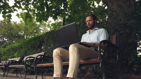 Businessman work in park Stock Footage 93247240