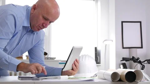 Businessman Work Use Tablet and Adding Machine for Plans Projects and Documents Stock Footage 98261691